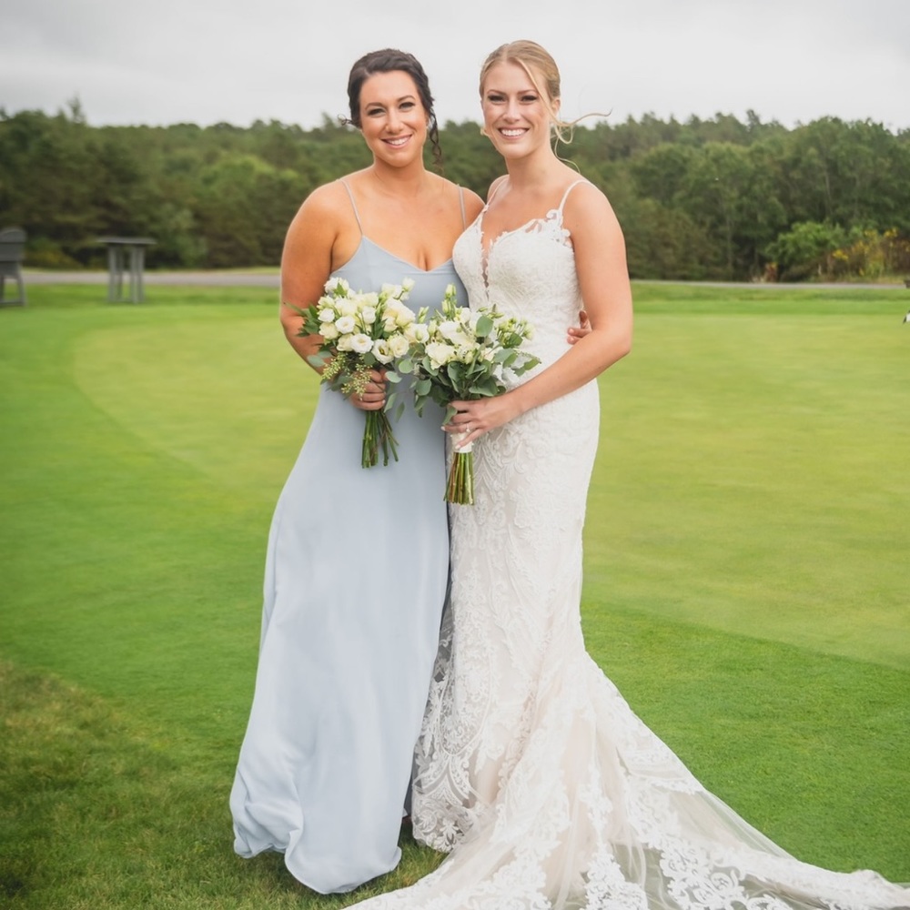 Light blue pastel bridesmaids dress.